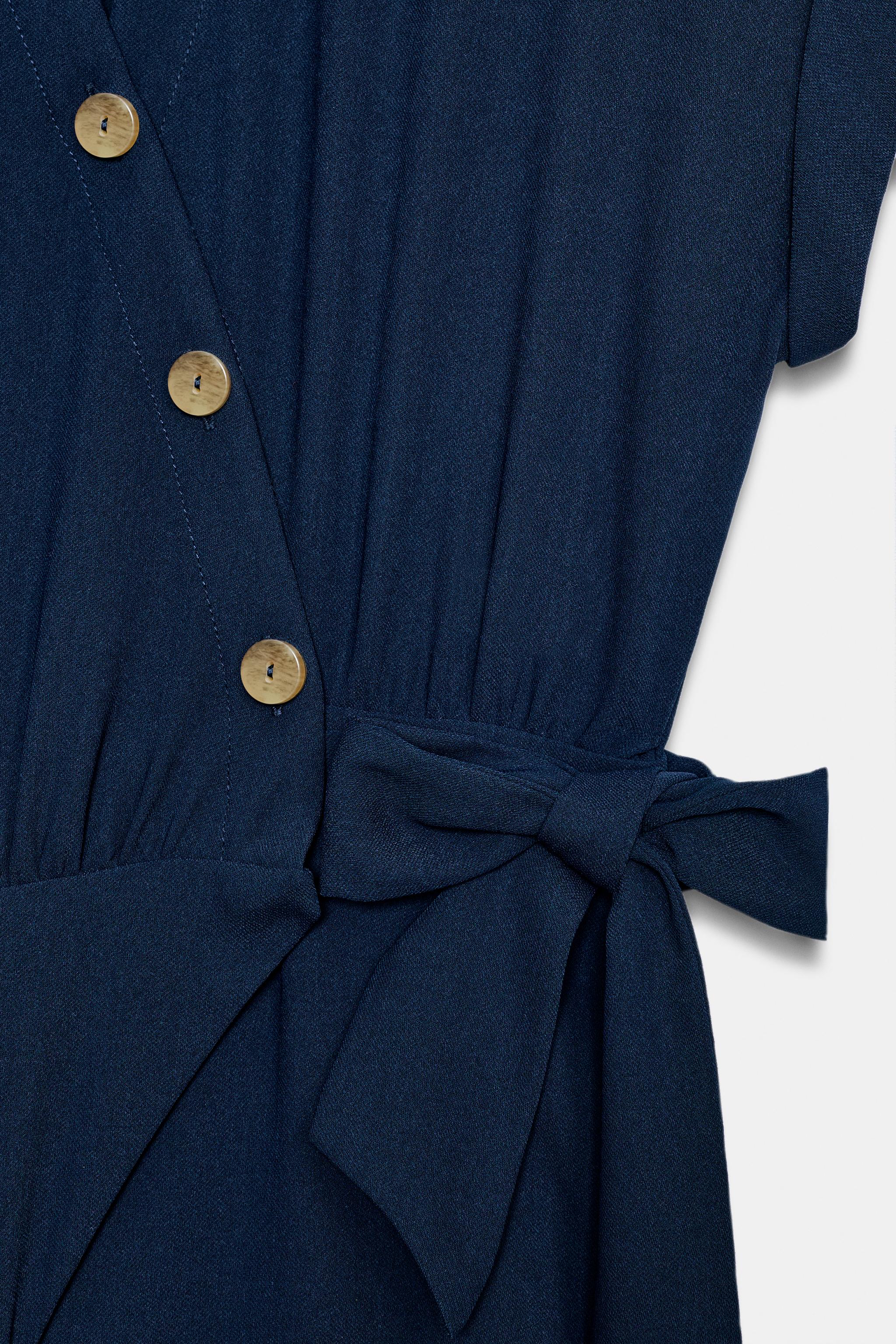 LONG BELTED JUMPSUIT